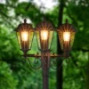 Lámpara de exterior Lindby Lamina, 172 cm, 3 luces, negro-óxido, E27
