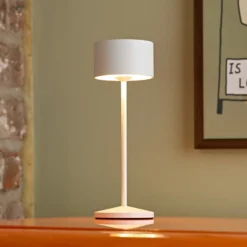 Lámpara de mesa LED recargable Veluna, blanca, altura 25 cm, IP44, atenuable,