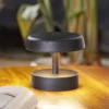 Lámpara de mesa Lindby LED recargable Nalani, 10 cm de altura, IP44, atenuable