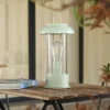 Lámpara de mesa recargable Lindby Yvette, verde, IP44, regulador táctil