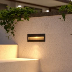 Lámpara de pared LED empotrable Lucande Loya, 23 x 8 cm, gris, IP54