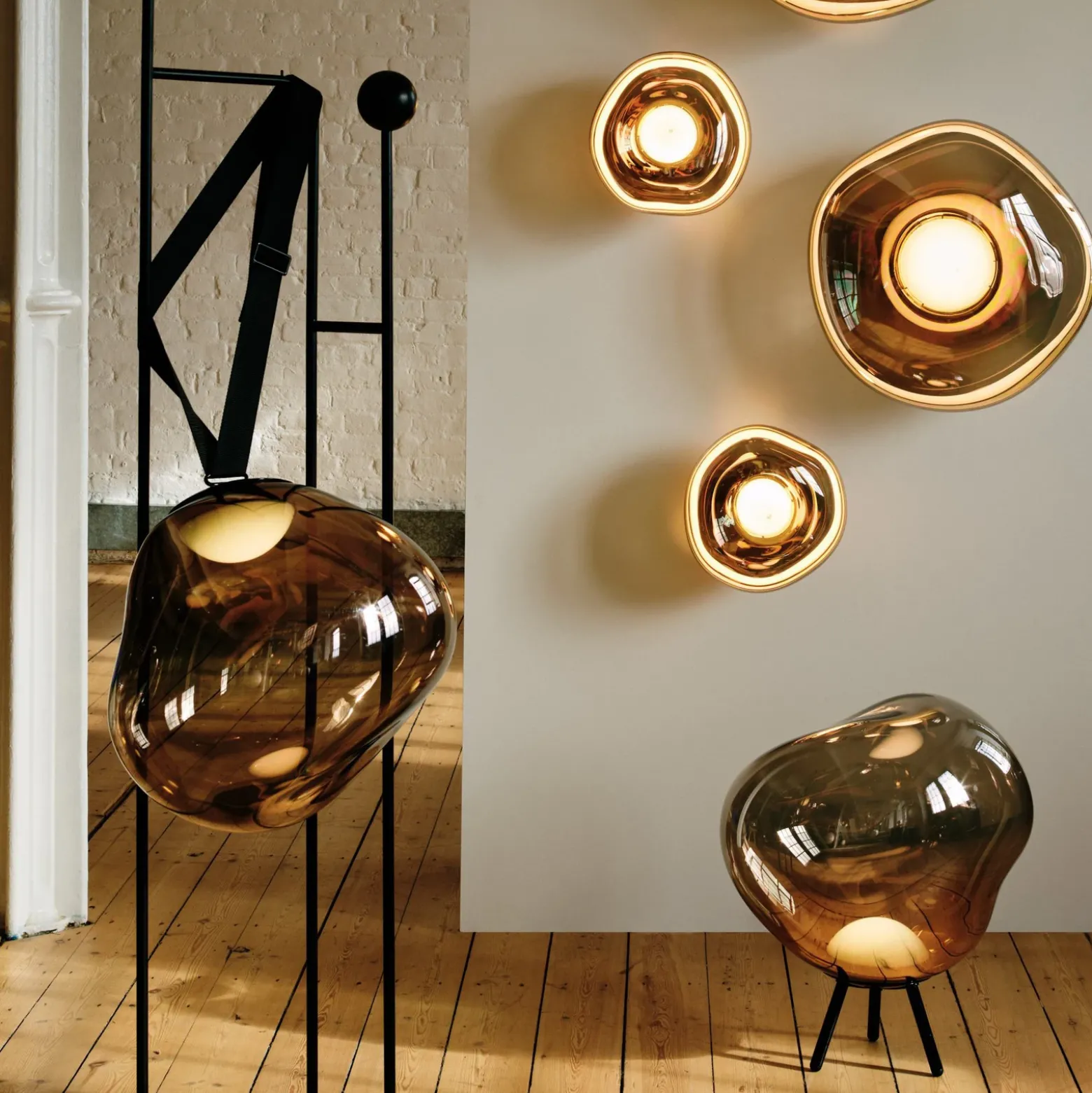 Lámpara LED recargable para terraza Melt grande, color dorado, de Tom Dixon