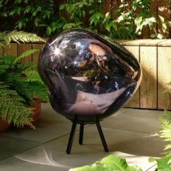 Lámpara LED recargable para terraza Melt grande de Tom Dixon, gris humo