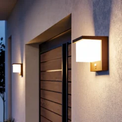 Lámpara LED solar de pared Frigento en color óxido, altura 15 cm, con sensor