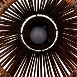 Lámpara LED solar Lindby Amaria, ratán, oscura, Ø 27 cm