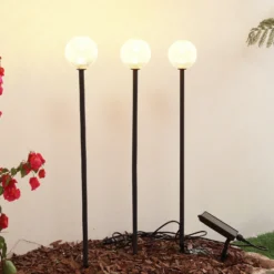 Lámpara LED solar Lindby Brindley, juego de 3, negro, cristal