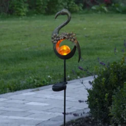 Lámpara LED solar Melilla Bird en forma flamenco