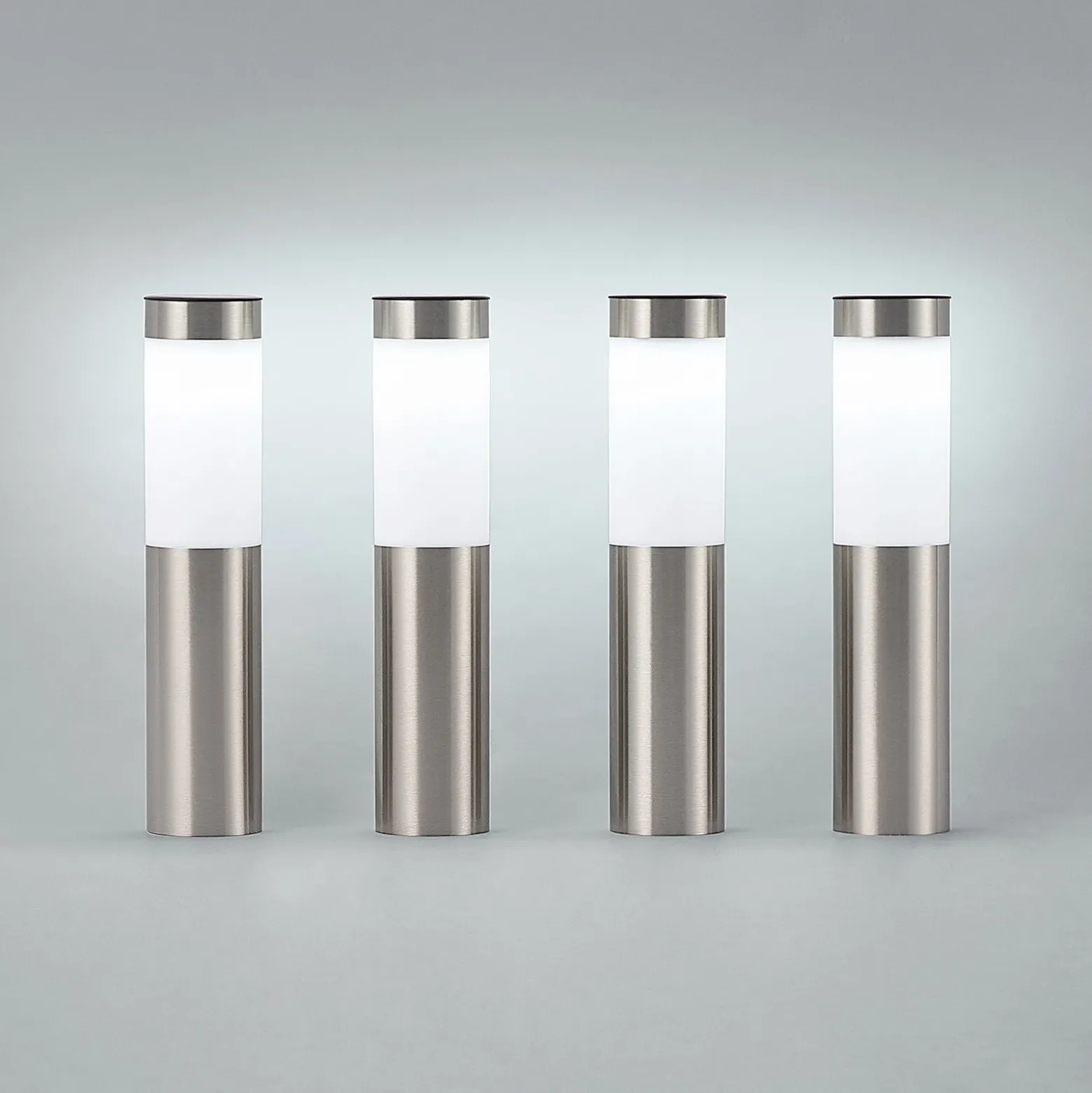 Lámpara sobremuro LED solar de Lindby, juego de 4, piqueta, 31 cm, IP44
