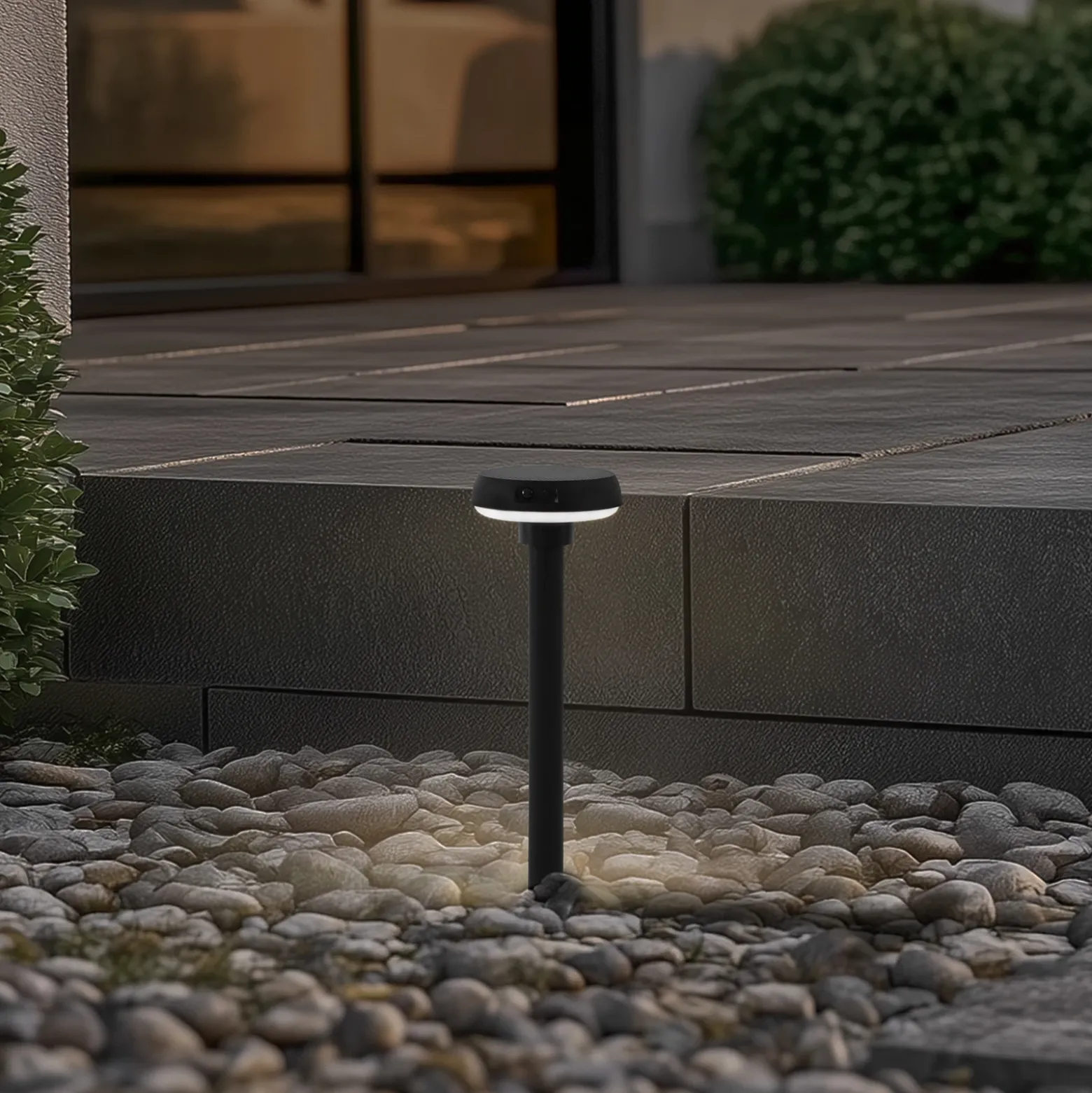 Lámpara solar LED con pica para suelo Lindby Brinca, negro, PC, sensor