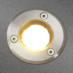 Lucande Lámpara de suelo LED empotrable Kenan, Ø 7 cm, acero inoxidable, IP67