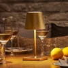 Nuindie mini lámpara de mesa LED recargable, USB-C, oro, IP54, atenuable