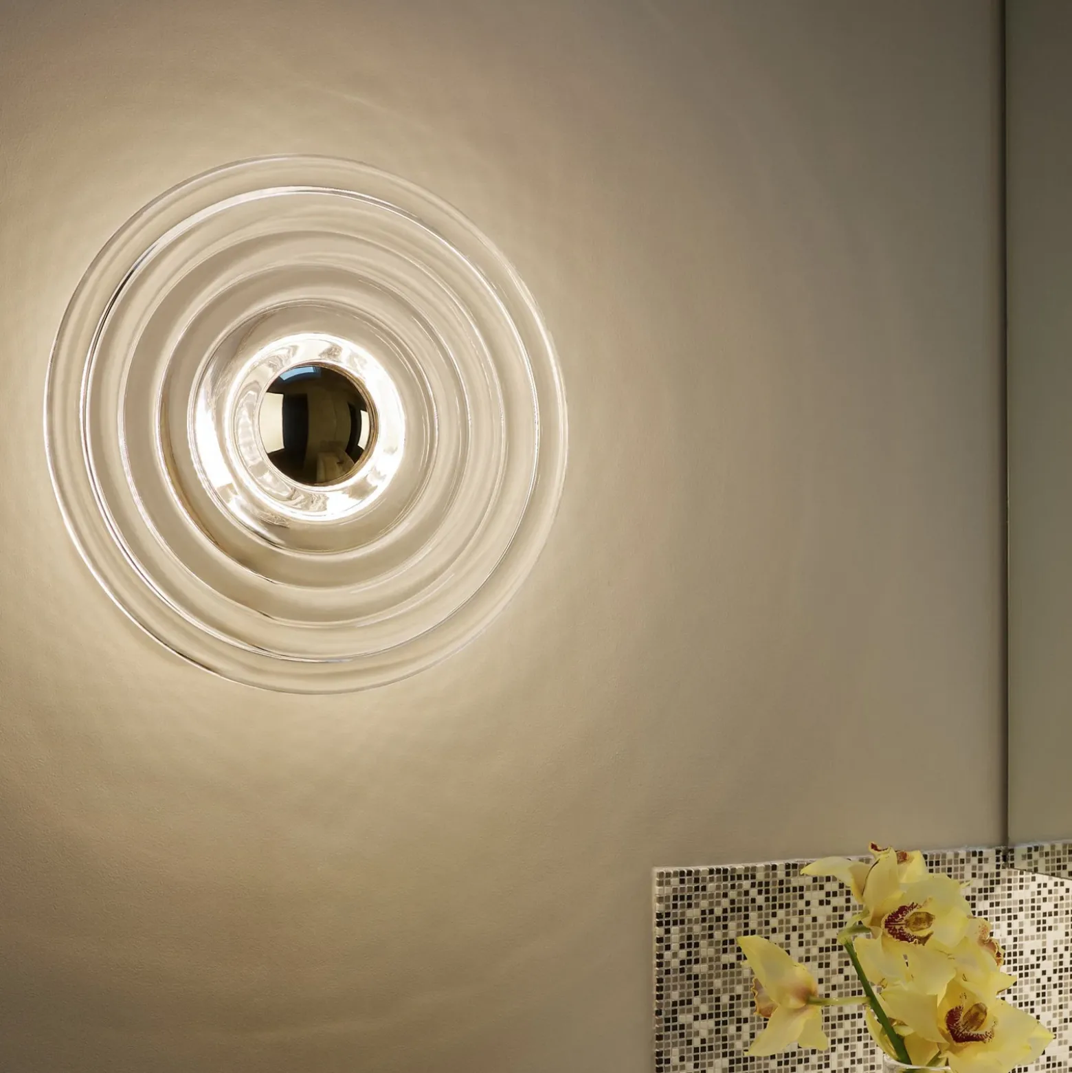 Tom Dixon Aplique de pared LED Press Mini, transparente, 21 cm, IP55